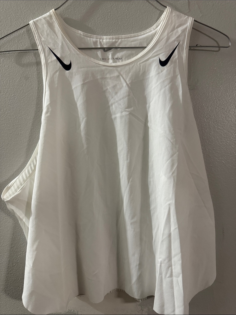 Nike White Sleeveless Performance Tank with Black Swoosh